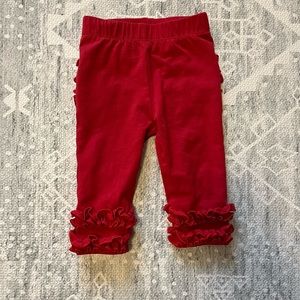 NWOT Rufflebutts red leggings size 0-6 months.